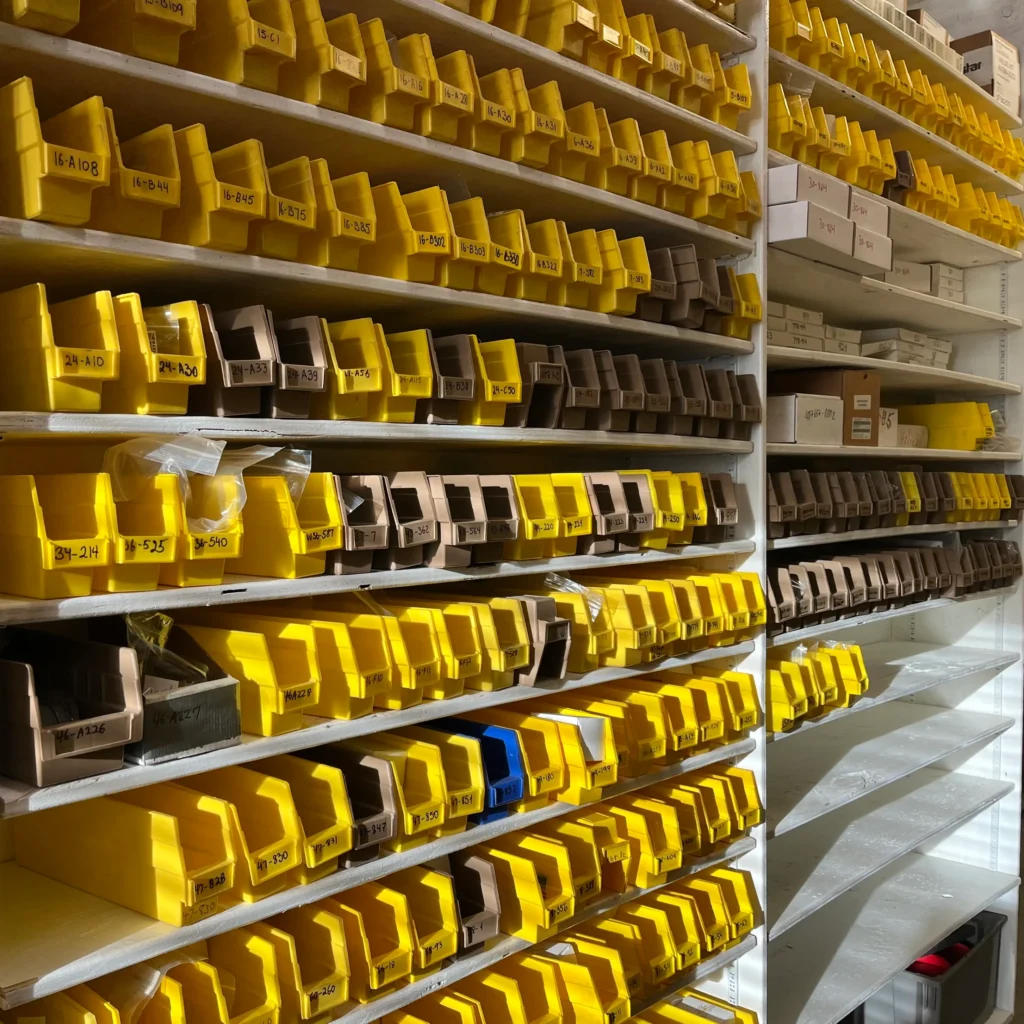 Shelves full of PM aircraft parts at Alaskan Aircraft Engiens